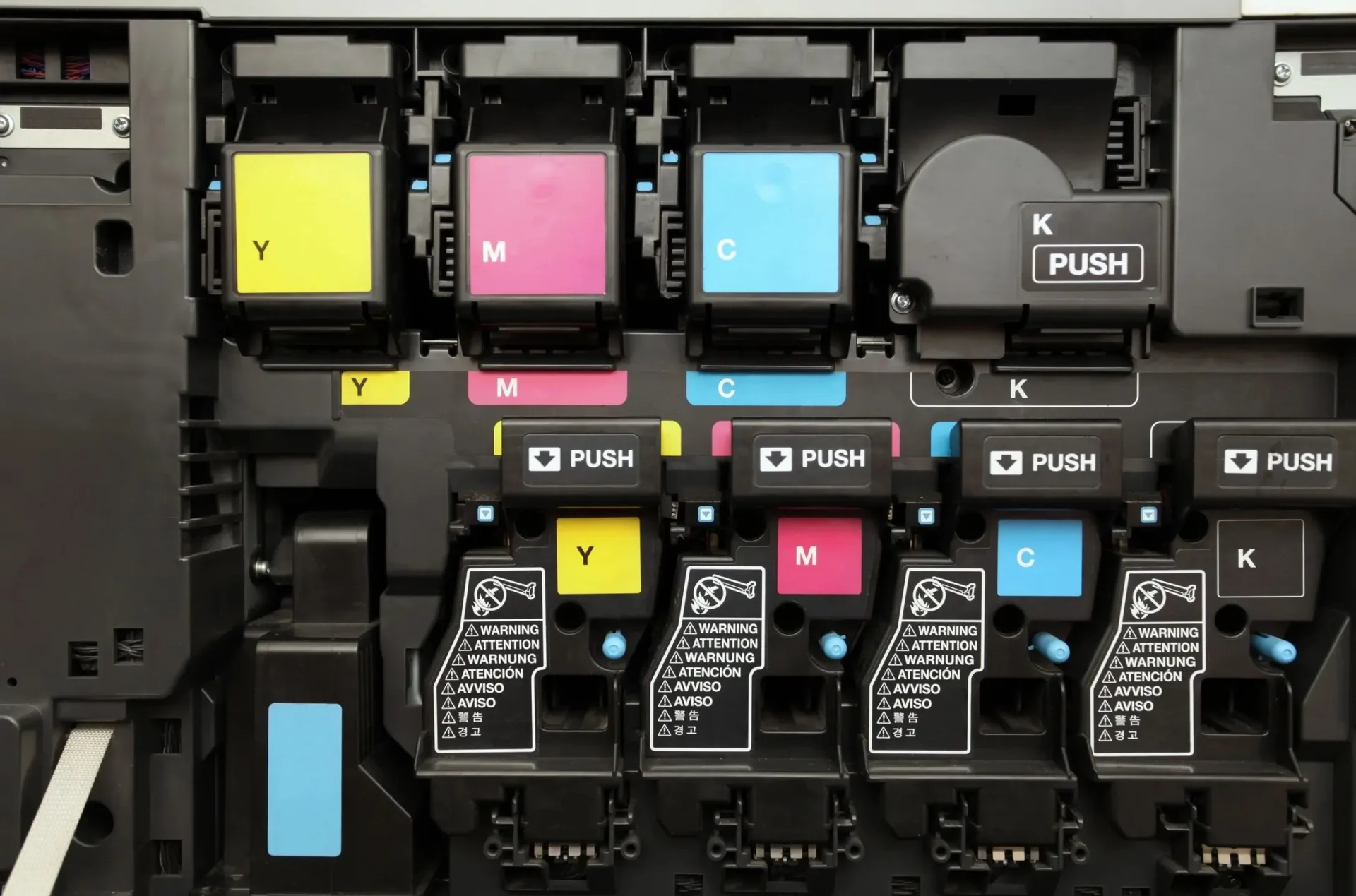 A bunch of different ink cartridges are lined up