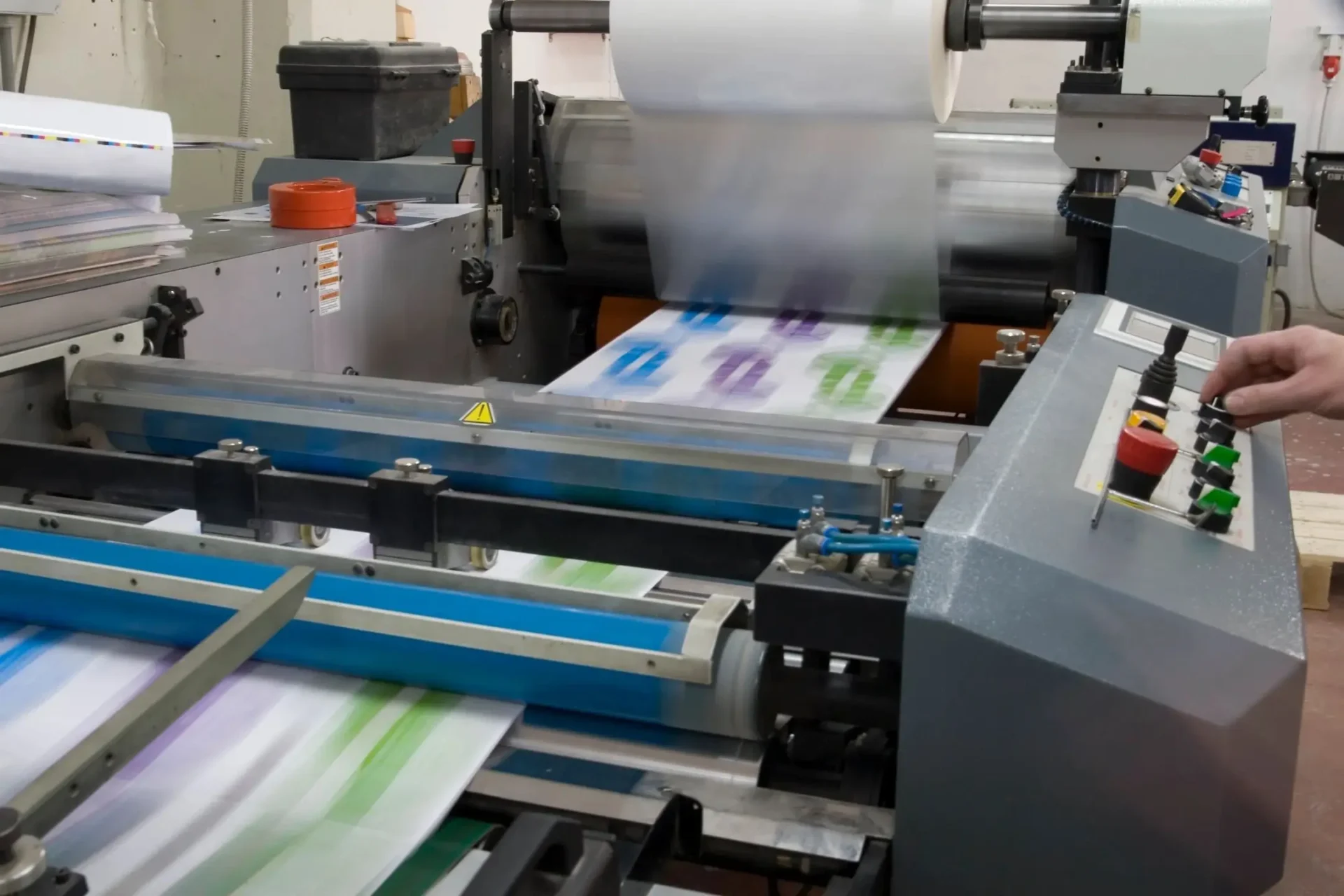 A machine that is printing out some type of paper.