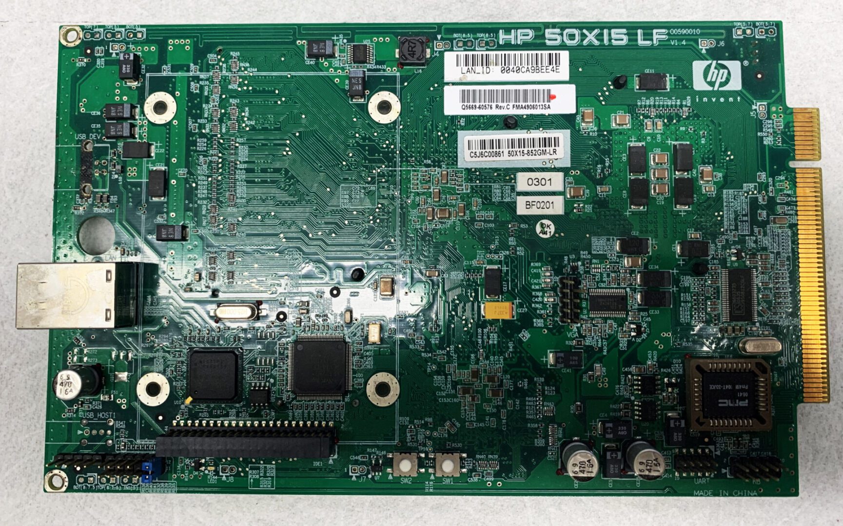 A computer board with many different parts