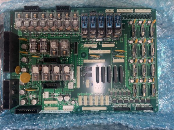 A close up of the electronics board on a blue blanket