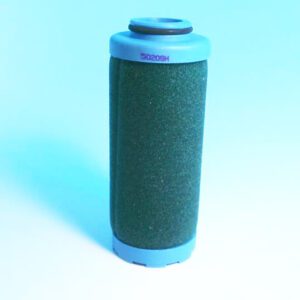 A blue and black cylinder on a table