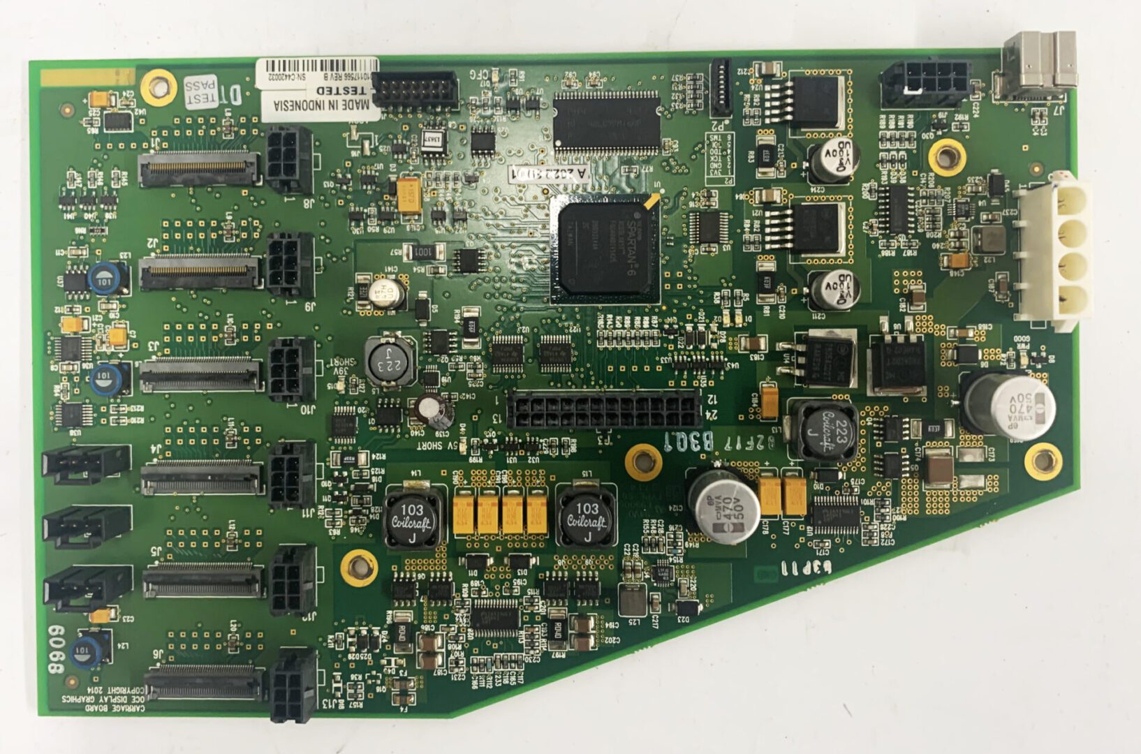 A close up of the back side of an electronic board