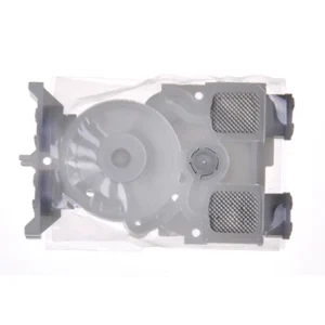 A white plastic box with some parts on it