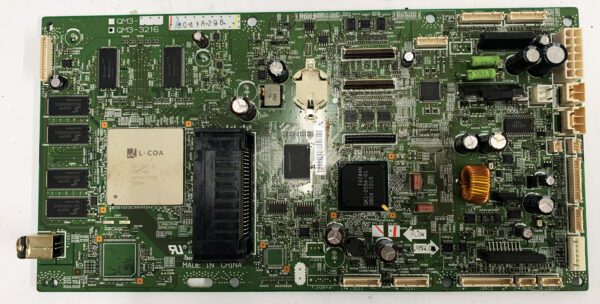 A computer board with many different electronic components.