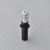 A black and silver metal object on top of a table.