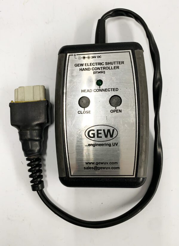 A silver and black device is connected to an electrical cord.