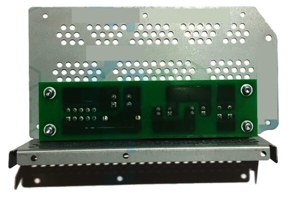 A green and white circuit board sitting on top of a metal frame.